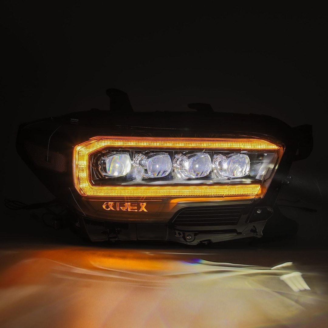 Alpharex USA Headlight Assembly, Nova-Series, LED Bulb, Projector Beam with White Daytime Running Light/ Amber Sequential Signal, 4 Osram LED – 880705