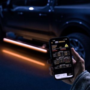 Amp Research Running Board, Powerstep™ Vision, Textured Powder Coated, Matte Black, Cast Aluminum, With Remote Operated LED Light System – 96152-01A
