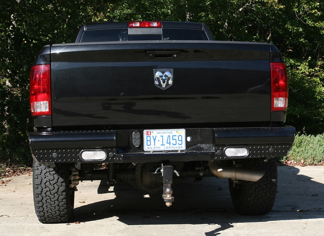 Fab Fours Bumper, Black Steel, One Piece Design, Mounting Hardware Included, With Two 6 Inch Oval LED Backup Lights – DR10-T2950-1