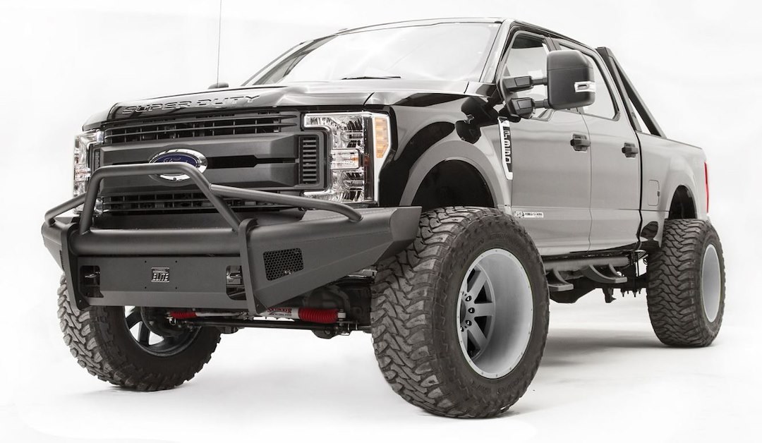 Fab Fours Bumper Filler Panel, Black Steel Elite, With Red Fab Fours Badge, For Half-Ton Trucks – Q20260-1