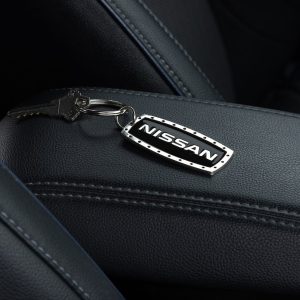Plasticolor Key Chain, Nissan Logo, Silver/Black, Metal and Enamel, With Heavy Duty Chrome Plated Split Ring and Clip – 004518R01