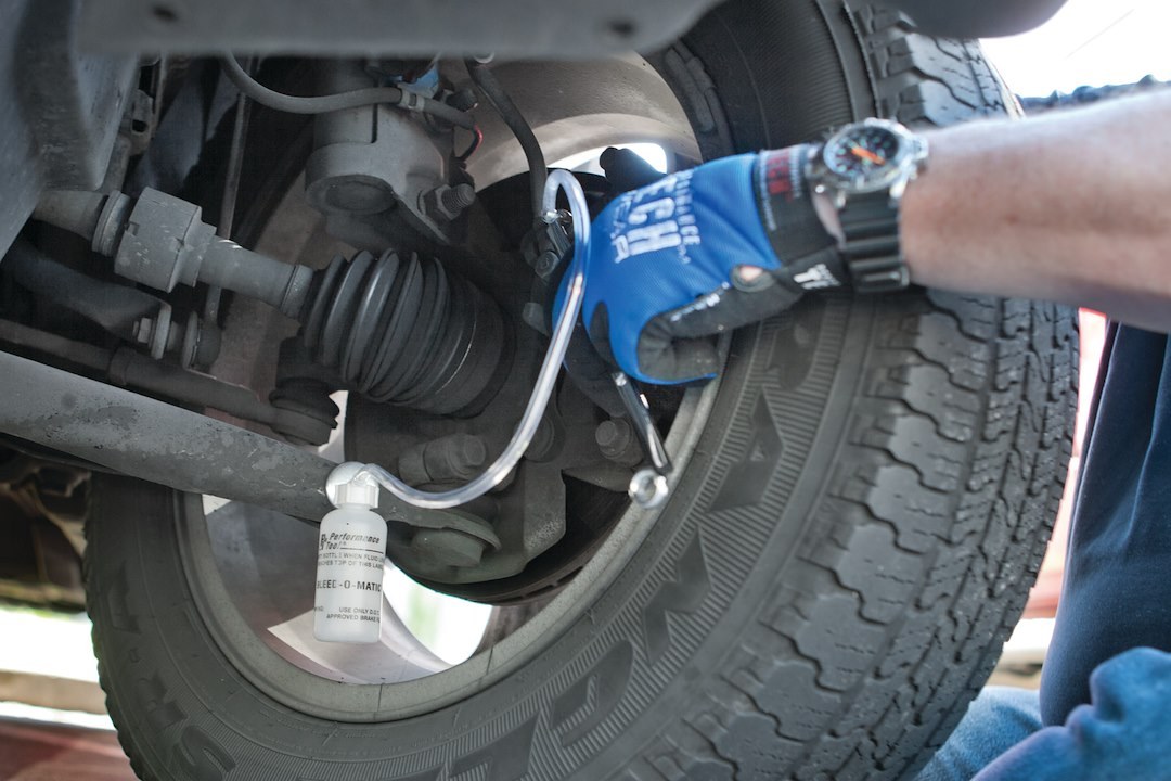 Performance Tool Brake Bleeder, Universal Allows One Person to Bleed the Brake System, White, With Collection Bottle/ 3 Hoses/ 4 Adapters – W80625
