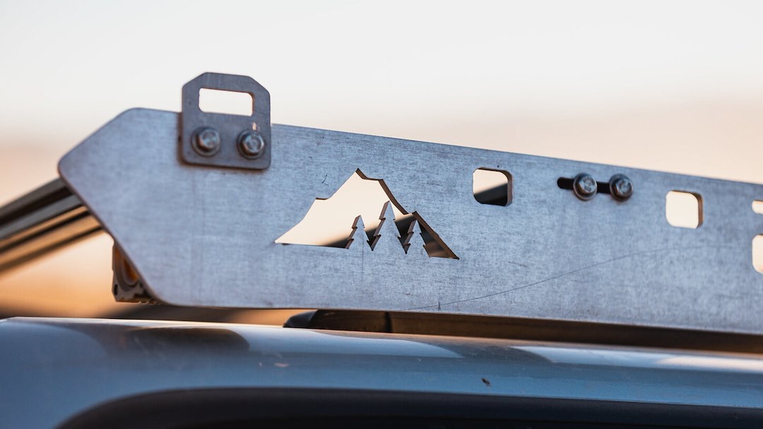 Sherpa Equip Tie Down Anchor, Smiley, Mounts to Sherpa Roof Racks, Textured, Black Aluminum Single – 211040