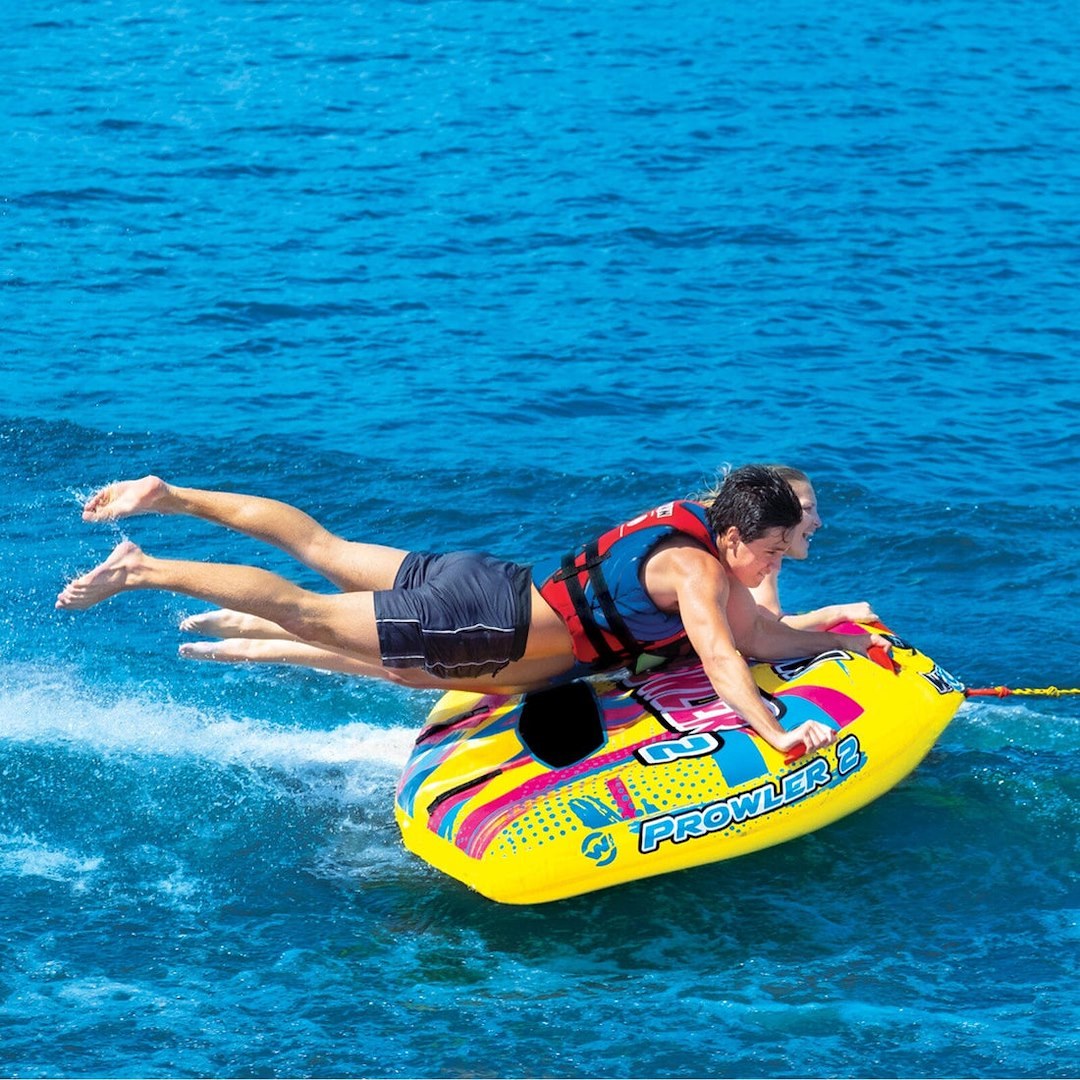 Wow Sports Towable Tube, Prowler, 1 to 2 Riders/ 340 Pound Load Capacity, Multi-Color, With 12 Volt Air Pump and Rope – 22-WTO-3991