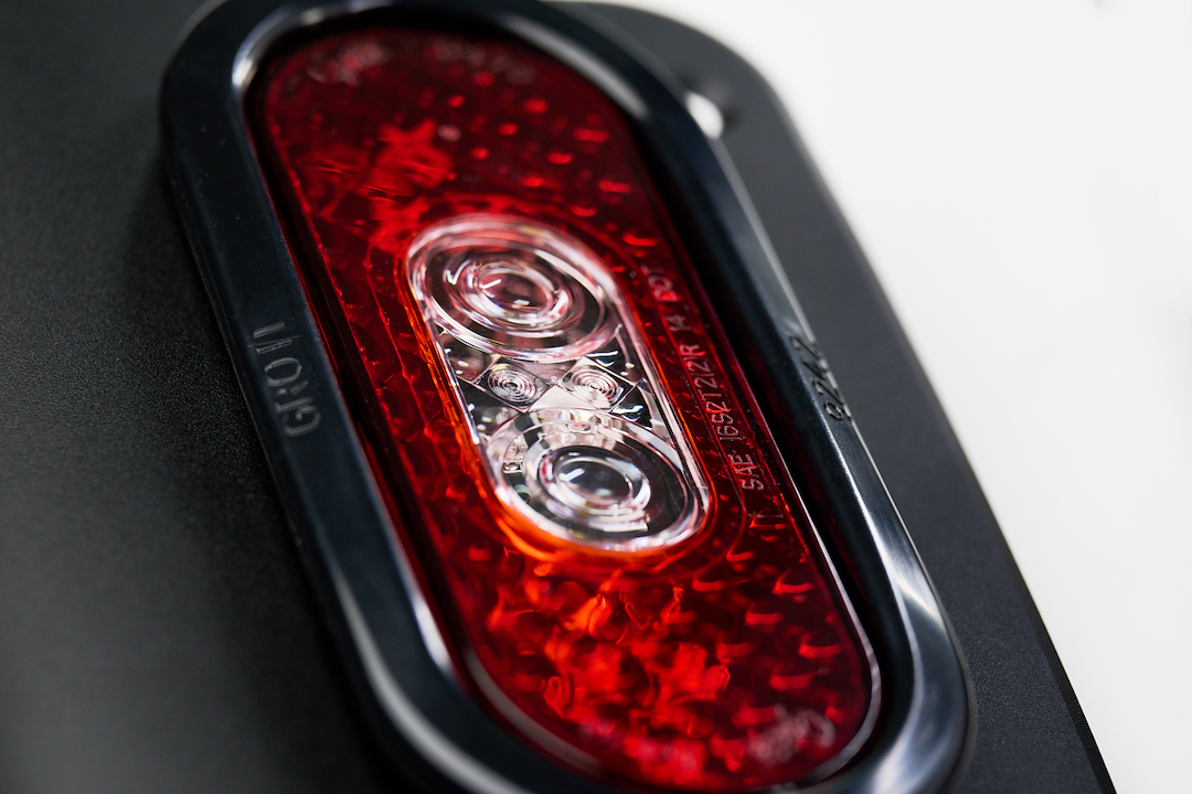Combat Offrd Tail Light Assembly, Tail Gunner Armor, Clear/ Red Lens, Powder Coated Black Aluminum Housing, LED, White Bulb, Set of 2 – 25-1050